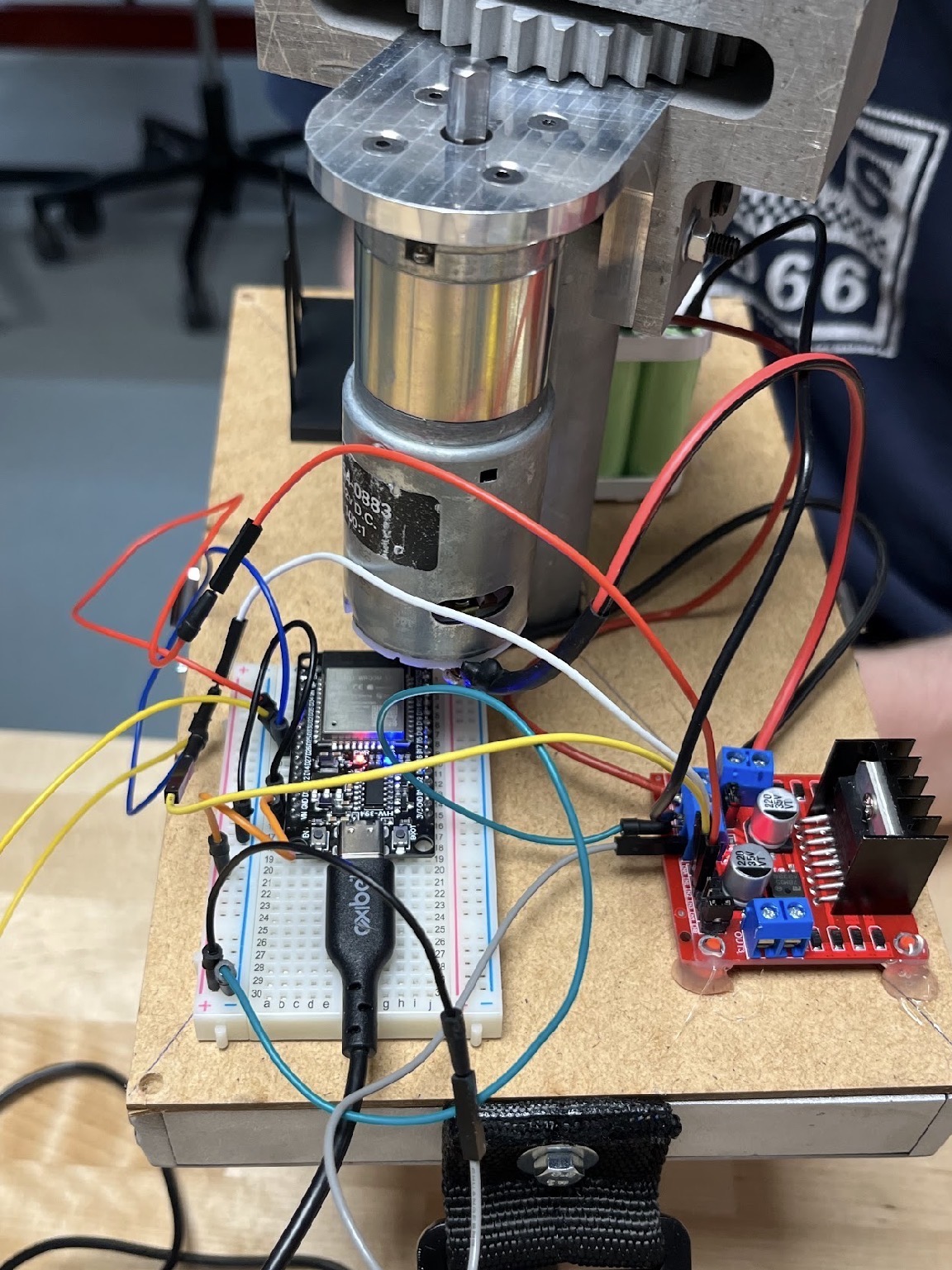 Close-up of the ESP32, L298N driver, motor and custom actuator assembly
