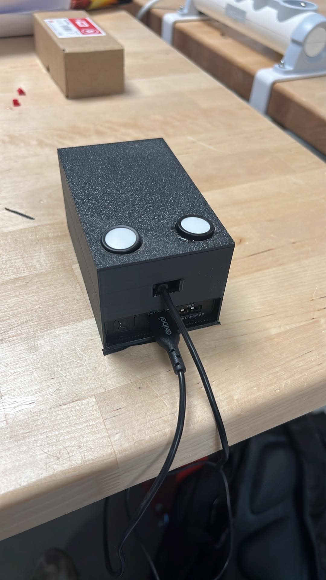 Completed two-button handheld controller for the QuAC prototype